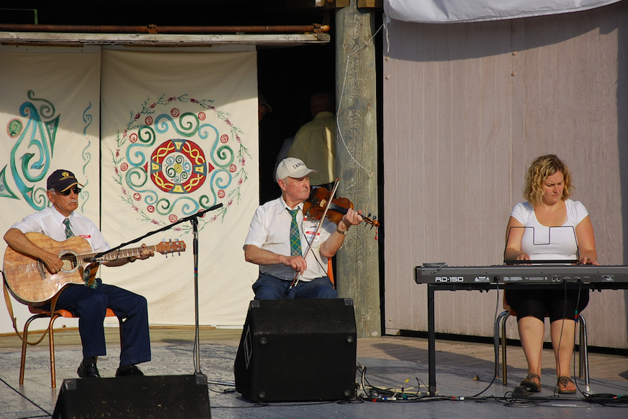 [dsc_5976.jpg] Éphrem Bourgeois on fiddle accompanied by Leanne Aucoin on keyboards and Denis Larade on guitar