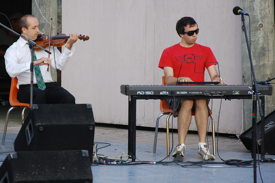 [dsc_6067.jpg] Brad Reed on fiddle accompanied by Kolten MacDonnell on keyboards