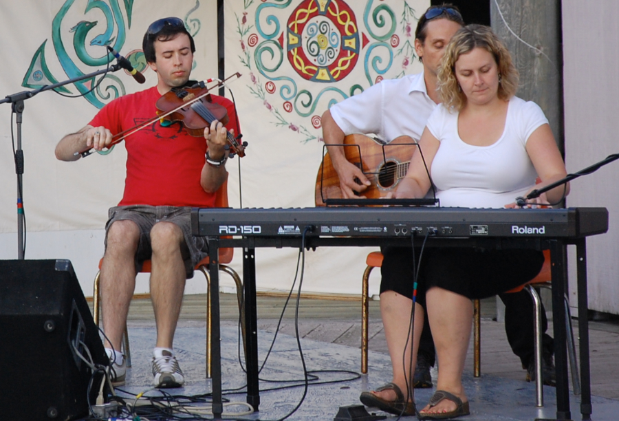 [dsc_6079.jpg] Kolten MacDonnell on fiddle accompanied by Leanne Aucoin on keyboards and Jesse Lewis on guitar