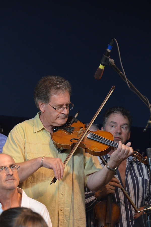 Allie Bennett plays the tribute number on fiddle