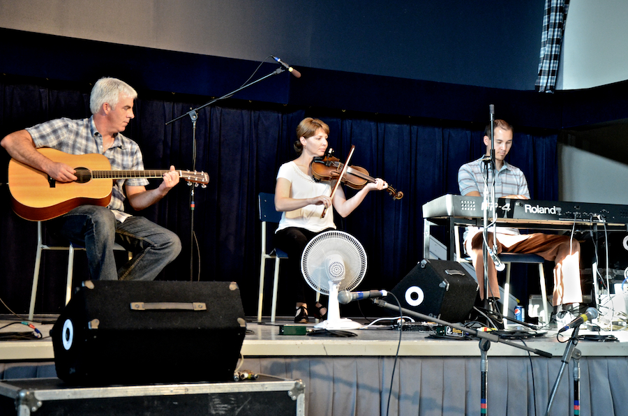 Melody Cameron on fiddle accompanied by Tyson Chen on keyboards and Derrick Cameron on guitar