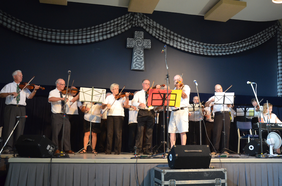 Cape Breton University Seniors Fiddling Group directed by Eddie Rogers and accompanied by Leanne Aucoin on keyboards