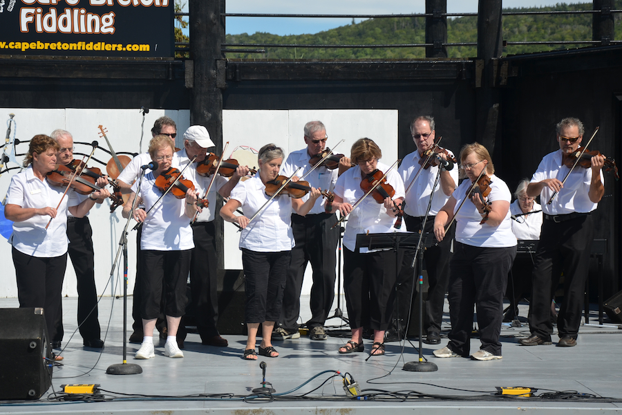 The Prince Edward Island Fiddlers directed by Kathryn Dau-Schmidt and accompanied by Marion Pirch on keyboard