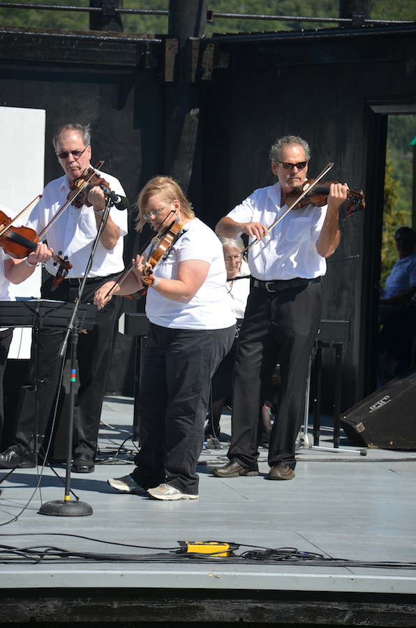 The Prince Edward Island Fiddlers directed by Kathryn Dau-Schmidt and accompanied by Marion Pirch on keyboard