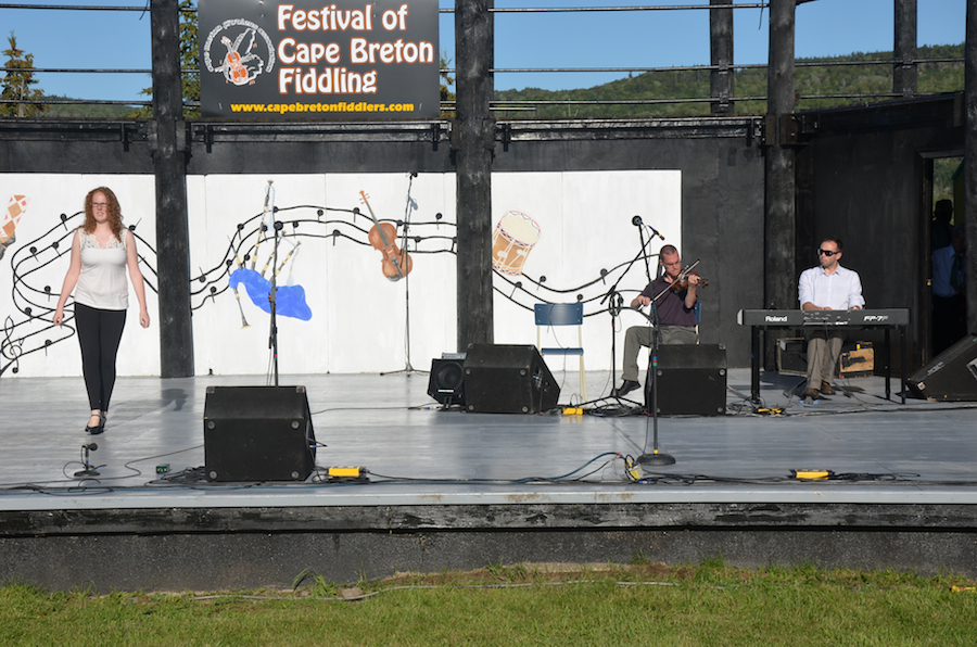 Ava Sturm step‑dancing to the music of Mike Hall on fiddle and Kolten Macdonell on keyboard