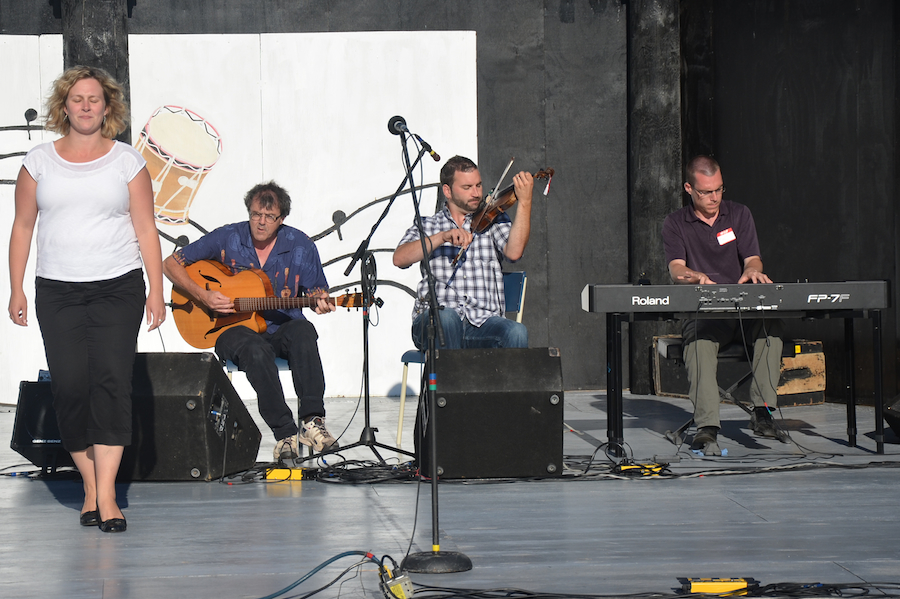 Leanne Aucoin step-dancing to the music of Brent Aucoin on fiddle, accompanied by Mike Hall on keyboard, and Paul MacDonald on guitar