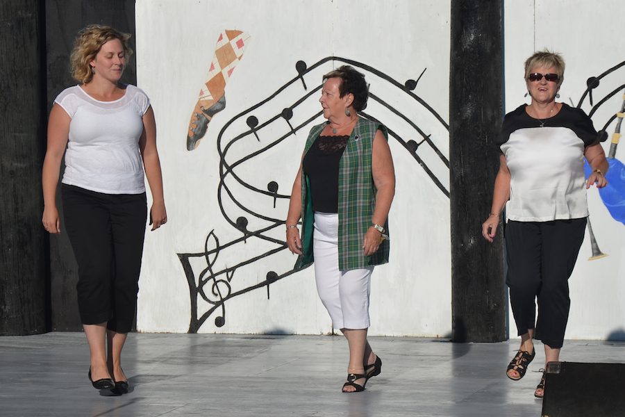 Leanne Aucoin, Kay Hanrahan, and Betty Matheson step-dancing