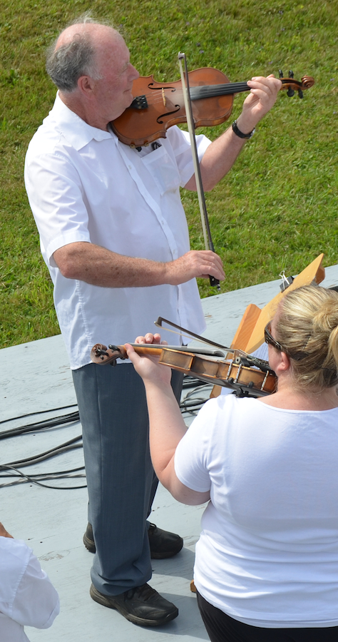 Eddie Rogers on fiddle and directing
