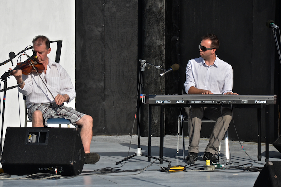 Larry Parks on fiddle accompanied by Kolten MacDonell on keyboard