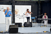 Fred McCracken singing Oh Danny Boy, accompanied by Michaela Forgeron on fiddle and Janet Cameron on keyboard