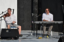Larry Parks on fiddle accompanied by Kolten MacDonell on keyboard