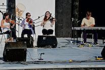 Michaela Forgeron, Natalie DeCoste, and Kayla Marchand on fiddles accompanied by Lawrence Cameron on keyboard