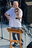 Eddie Rogers on fiddle and directing