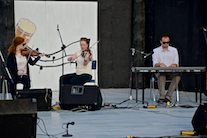Margie and Dawn Beaton on fiddles accompanied by Kolten MacDonell on keyboard