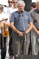 Frank MacInnis reads the list of deceased members