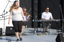 Kayla Marchand step‑dancing to the music of Dara MacDonald on fiddle and Kolten MacDonell on keyboard