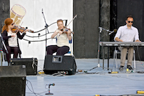 Margie and Dawn Beaton on fiddles accompanied by Kolten MacDonell on keyboard