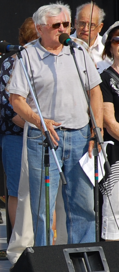 Frank MacInnis reads the list of deceased members