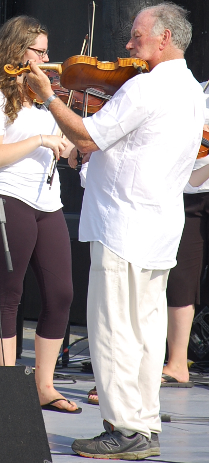 Eddie Rogers directing and on fiddle