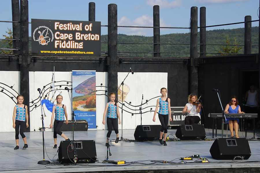 Dancers from the Kelly MacArthur School of Dance step dancing to the music of Leanne Aucoin on fiddle and Dawn MacDonald-Gillis on keyboard