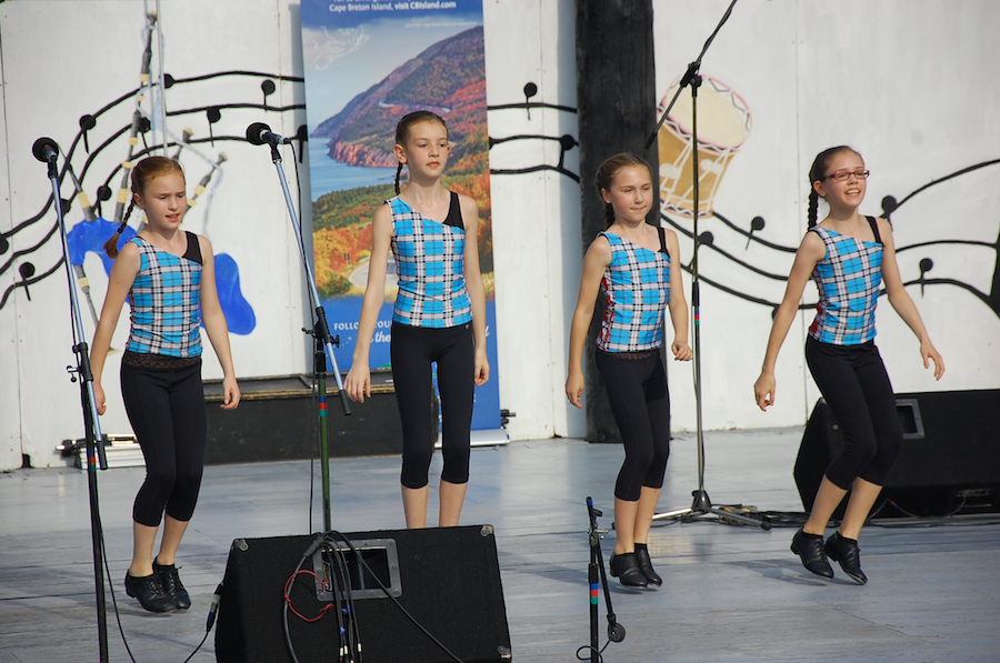 Olivia Burke, Zoe MacIsaac, Brenley Gillis, and Drea Shepherd step-dancing