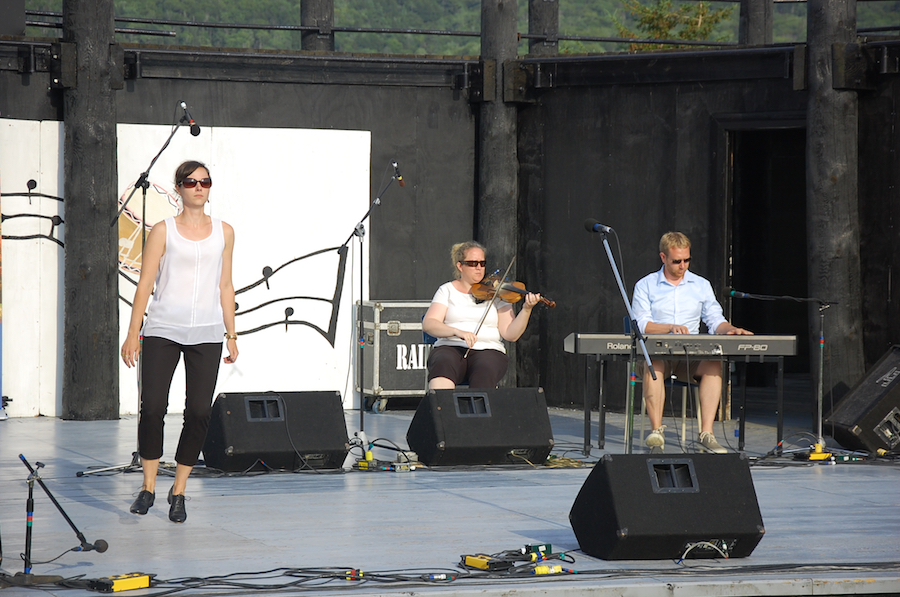 Stephanie MacDonald step‑dancing to the music of Dara Smith-MacDonald on fiddle and Adam Young on keyboard
