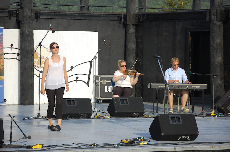 Stephanie MacDonald step‑dancing to the music of Dara Smith-MacDonald on fiddle and Adam Young on keyboard