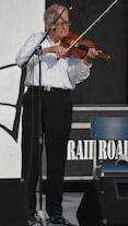 Father Francis Cameron on fiddle