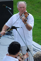 Eddie Rogers directing and on fiddle