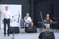 John Robert Gillis step‑dancing to the music of Kinnon Beaton on fiddle and Betty Lou Beaton on keyboard