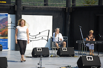 Leanne Aucoin step‑dancing to the music of Kinnon Beaton on fiddle and Betty Lou Beaton on keyboard