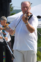 Eddie Rogers directing and on fiddle