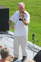 Eddie Rogers on fiddle and directing
