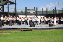 The Cape Breton Fiddlers’ Association plays a set in tribute, directed by Eddie Rogers and accompanied by Betty Lou Beaton on keyboard