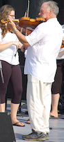 Eddie Rogers directing and on fiddle