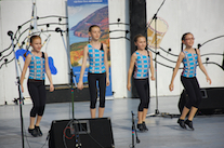 Olivia Burke, Zoe MacIsaac, Brenley Gillis, and Drea Shepherd step-dancing