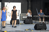 Dawn MacDonald-Gillis and Helen MacDonald step‑dancing to the music of Leanne Aucoin on fiddle and Doug MacPhee on keyboard