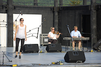 Stephanie MacDonald step‑dancing to the music of Dara Smith-MacDonald on fiddle and Adam Young on keyboard