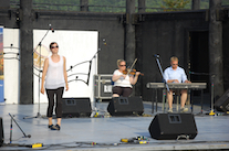 Stephanie MacDonald step‑dancing to the music of Dara Smith-MacDonald on fiddle and Adam Young on keyboard