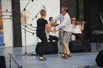 Betty Matheson and Larry Parks do a celebratory step dance