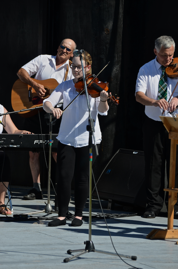 The Cape Breton Fiddlers’ Association plays its second group number in tribute