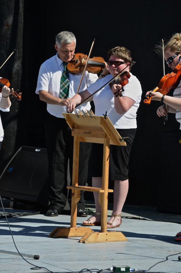 The Cape Breton Fiddlers’ Association plays its second group number in tribute