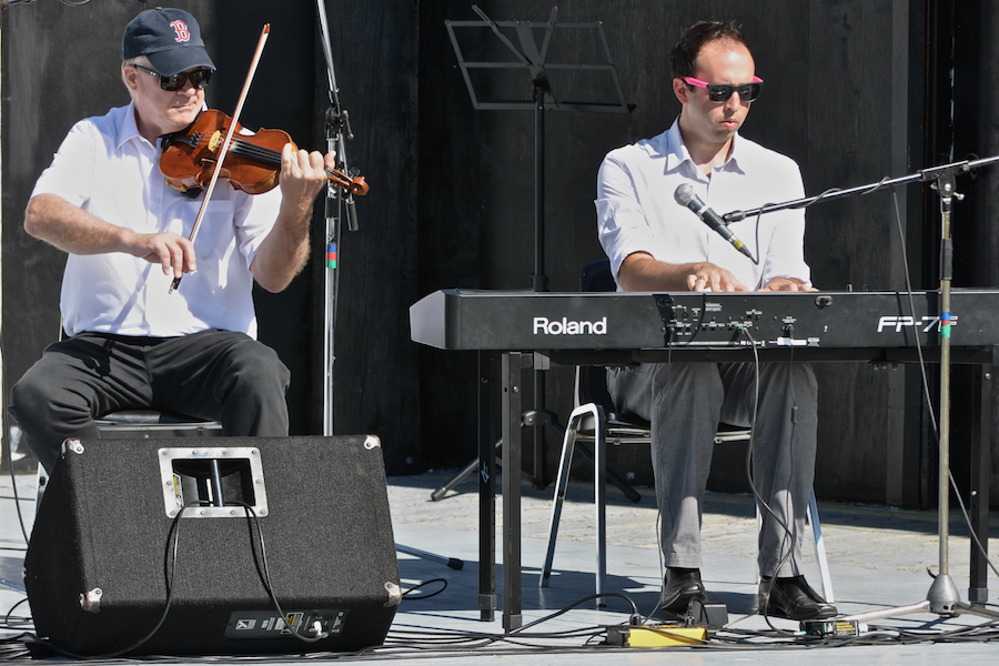 Bernard MacDonnell on fiddle accompanied by Kolten MacDonell on keyboard