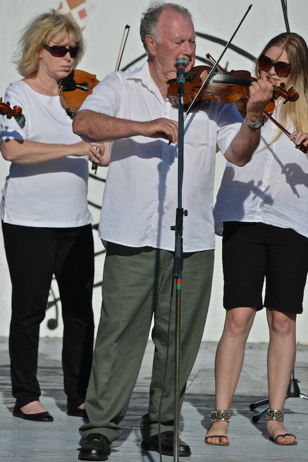 Eddie Rogers directing and on fiddle