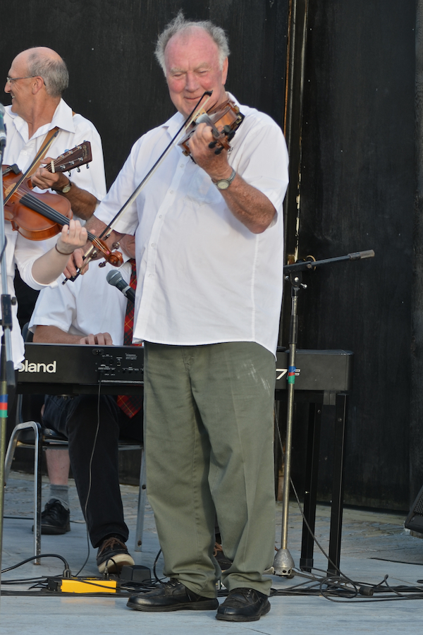 Eddie Rogers directing and on fiddle