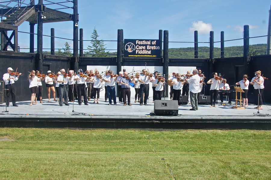 Cape Breton Fiddlers’ Association First Group Number, directed by Eddie Rogers and accompanied by Lawrence Cameron on keyboard
