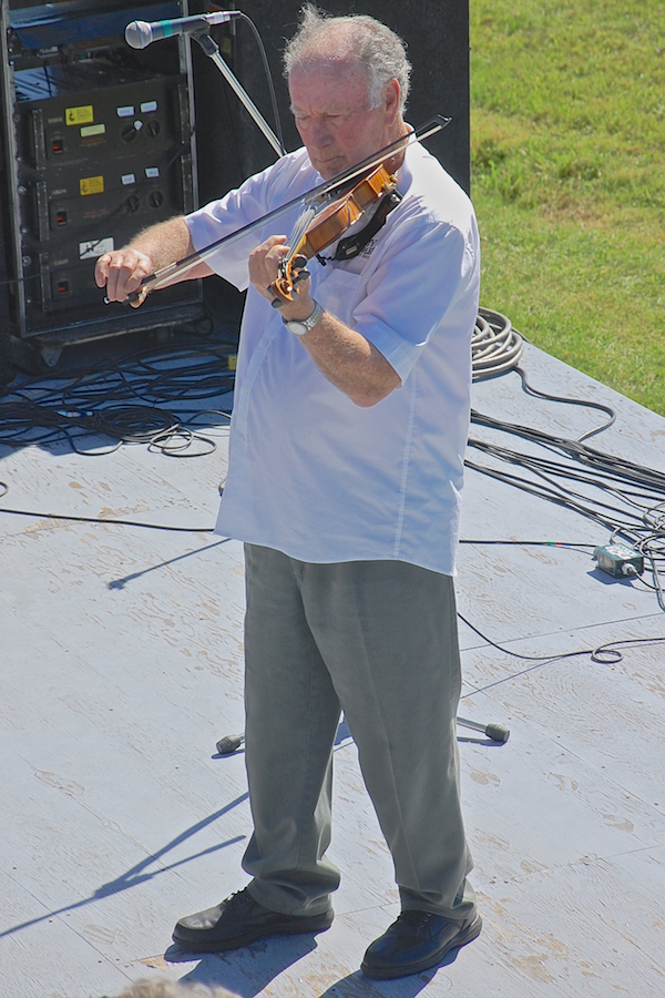 Eddie Rogers directing and on fiddle