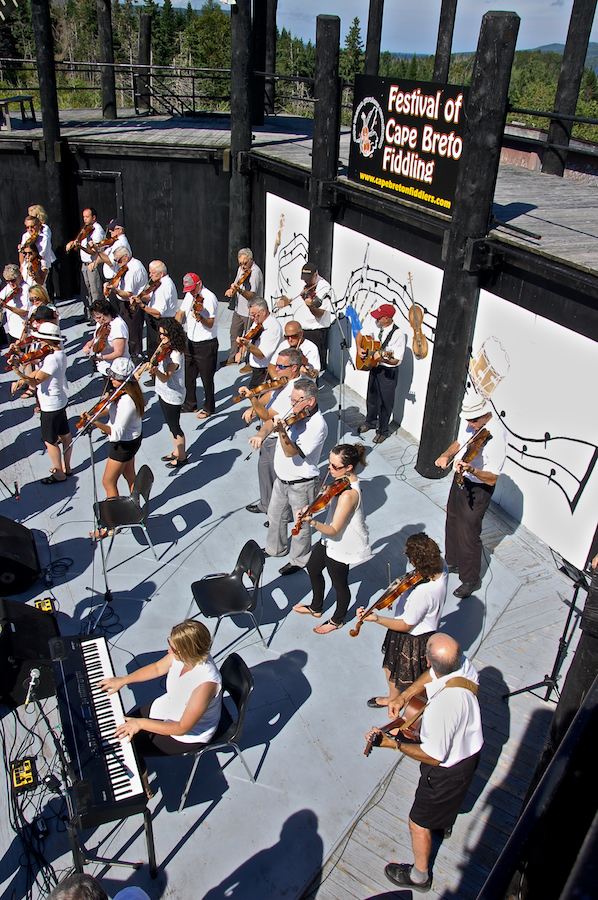The Cape Breton Fiddlers’ Association plays its second group number in tribute