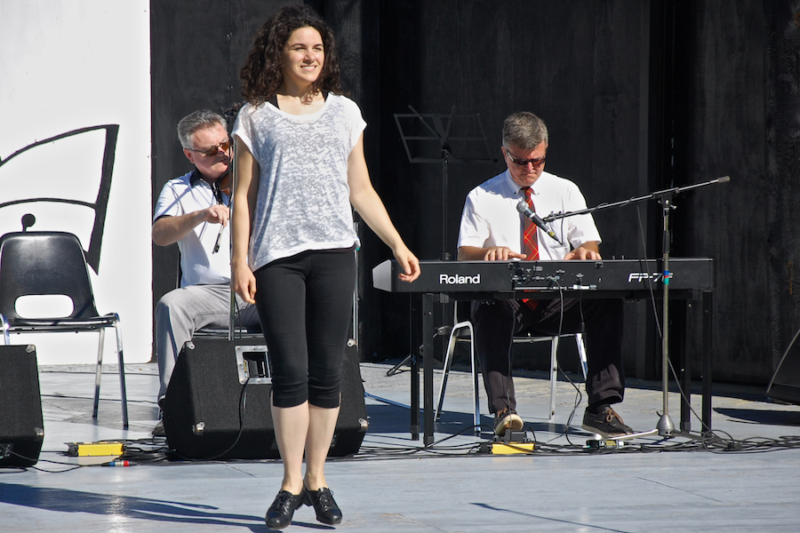 Lisa MacNeil step‑dancing to the music of Howie MacDonald on fiddle and Lawrence Cameron on keyboard