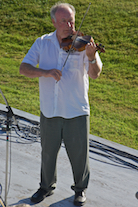 Eddie Rogers directing and on fiddle